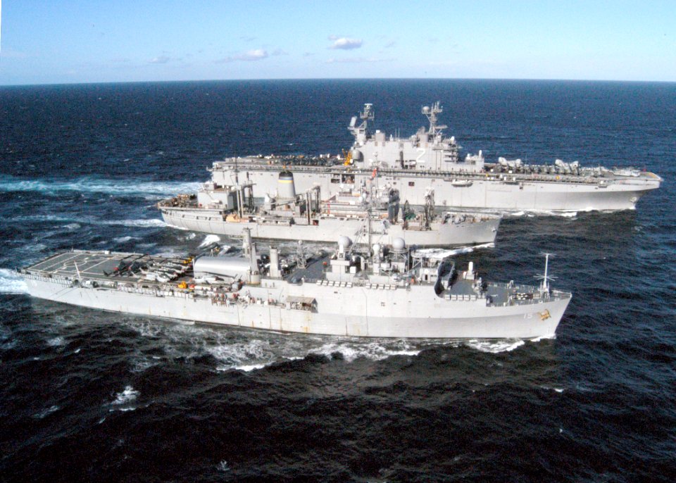 US Navy 030131-N-2972R-056 The auxiliary fleet oiler Spica prepares to conduct a simultaneous Refueling at Sea (RAS) with Amphibious Assault Ship USS Saipan (LHA 2) and Amphibious Transport Dock USS Ponce (LPD 15)