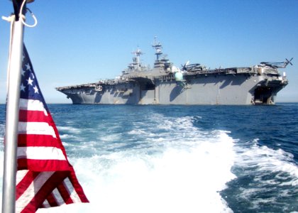 US Navy 030216-N-1512S-178 USS Kearsarge (LHD 3) is anchored in the Persian Gulf while conducting a Marine offload