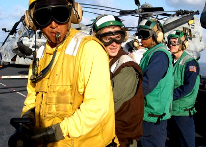 US Navy 030211-N-4048T-041 Sailors assigned to the Crash and Salvage Team conduct a flight deck fire drill