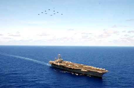 US Navy 030219-N-5884W-028 Aircraft assigned to Carrier Air Wing Nine (CVW-9) in formation, perform a fly-by