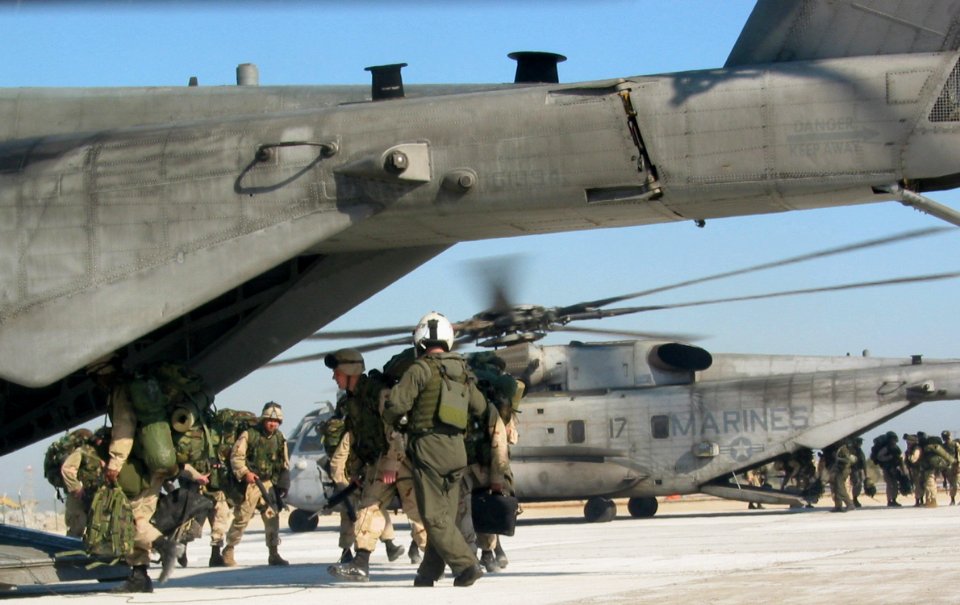 US Navy 030217-N-1050K-025 More than 1,000 U.S. Marines assigned to the 1st Battalion, 2nd Marines board CH-53E Super Stallions
