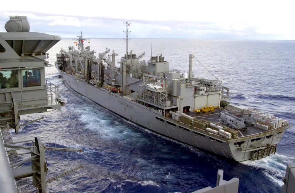 US Navy 030316-N-2385R-001 The aircraft carrier USS Nimitz (CVN 68) pulls alongside fast combat support ship USS Bridge (AOE 10) in preparation for a underway replenishment (UNREP)