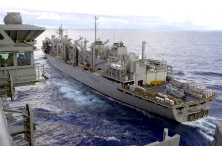 US Navy 030316-N-2385R-001 The aircraft carrier USS Nimitz (CVN 68) pulls alongside fast combat support ship USS Bridge (AOE 10) in preparation for a underway replenishment (UNREP)