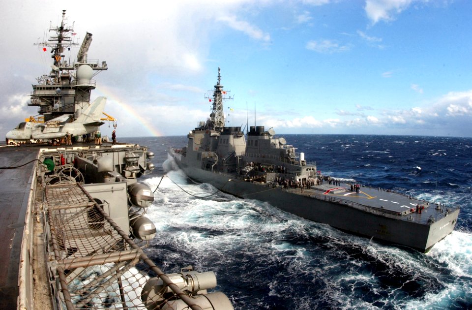 US Navy 021210-N-1810F-001 Japanese Maritime Self Defense Force (JMSDF) ship Chokai (DDF 176) come along side the Kitty Hawk to receive fuel during a replenishment at sea (RAS)