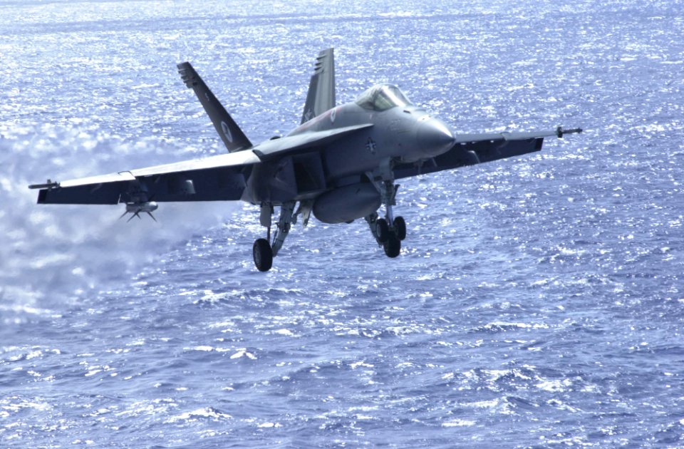 US Navy 030322-N-2143T-005 An F-A-18F Super Hornet prepares to make an arrested landing
