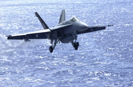 US Navy 030322-N-2143T-005 An F-A-18F Super Hornet prepares to make an arrested landing
