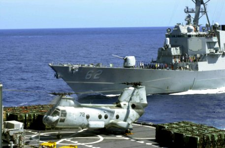US Navy 030319-N-2143T-013 A CH-46 Sea Knight transfers supplies from the fast combat support ship USS Bridge