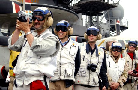 US Navy 030307-N-1810F-003 The Honorable Richard H. Jones (second from left), United States Ambassador to Kuwait, and guests observe flight operations aboard USS Kitty Hawk (CV 63), America's oldest active warship