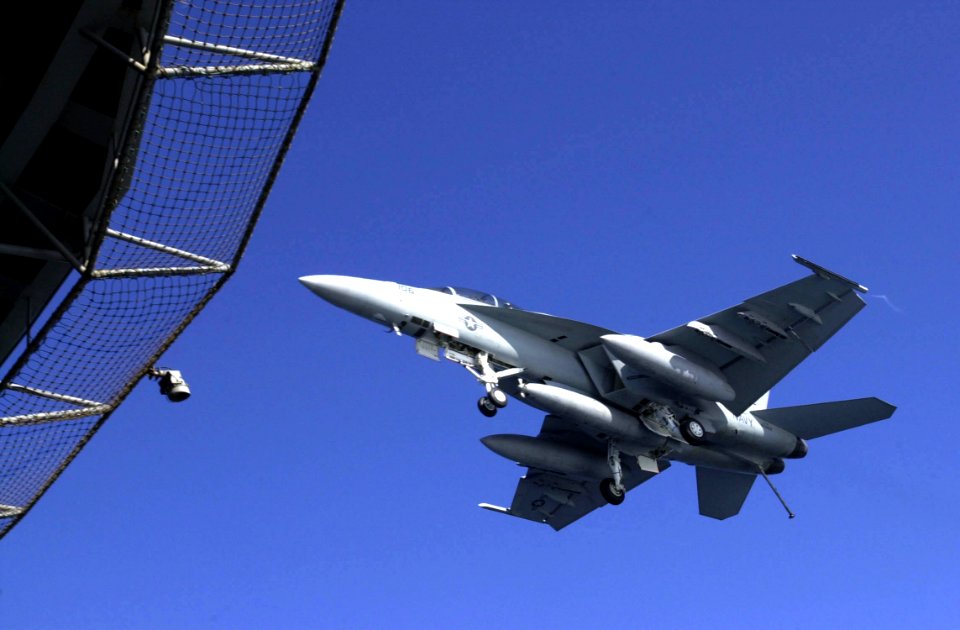 US Navy 030305-N-2143T-004 FA-18F Super Hornet assigned to the Black Aces of Strike Fighter Squadron Four One (VFA-41) comes in for a landing