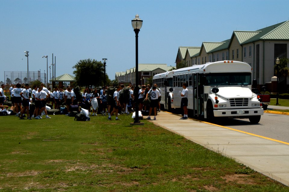 US Navy 050708-N-0000Z-003 Students assigned to Naval Aviation Technical Training Center (NATTC) load onto buses as they prepare to evacuate
