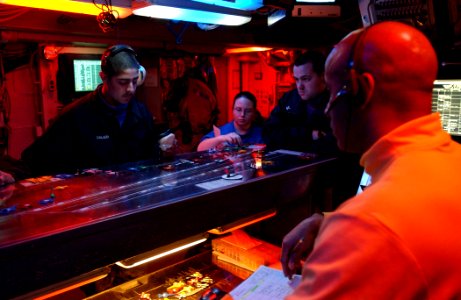 US Navy 030323-N-1328C-503 Watch standers in flight deck control monitor the position and movement of all aircraft aboard the aircraft carrier USS Theodore Roosevelt (CVN 71)