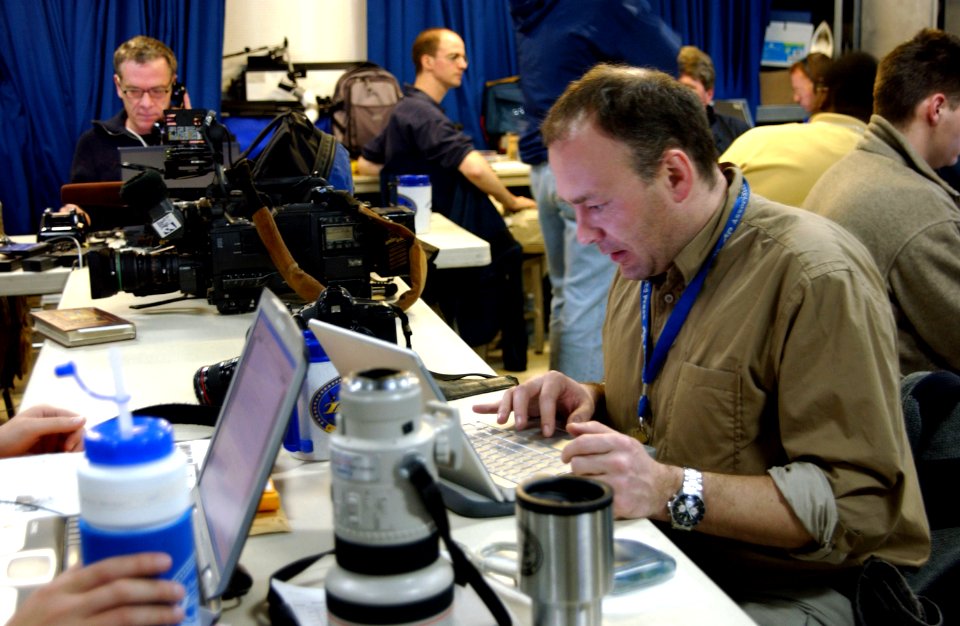 US Navy 030315-N-3235P-005 Associated Press photographer Markus Schreiber edits imagery shot on the flight deck of the aircraft carrier USS Harry S. Truman (CVN 75)