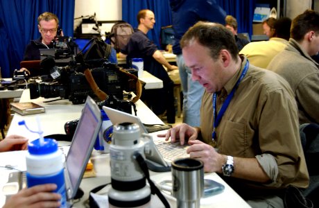 US Navy 030315-N-3235P-005 Associated Press photographer Markus Schreiber edits imagery shot on the flight deck of the aircraft carrier USS Harry S. Truman (CVN 75)