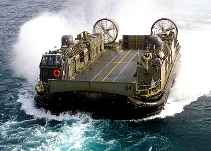 US Navy 030324-N-1512S-565 Hopper 36 from Assault Craft Unit Four (ACU-4) makes its approach to the well deck of the USS Kearsarge (LHD 3) during landing craft air cushion (LCAC) operations in the Arabian Gulf