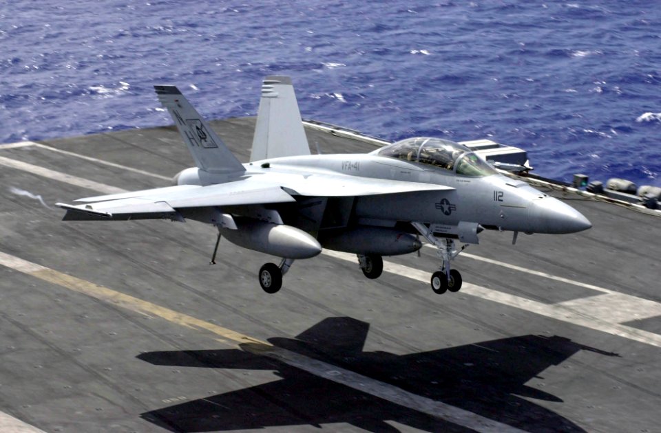 US Navy 030322-N-2143T-002 An F-A-18F Super Hornet prepares to make an arrested landing