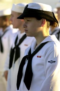 US Navy 030311-N-8273J-005 Airman Jaclyn Noriega, of Columbia, Md., mans the rails upon entering Pearl Harbor aboard the nuclear powered aircraft carrier USS Nimitz (CVN 68)