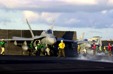 US Navy 030330-N-2385R-013 An F-A-18 Hornet assigned to the Mighty Strikes of Strike Fighter Squadron Ninety Four (VFA-94) prepares to take off from the flight deck aboard USS Nimitz (CVN 68)