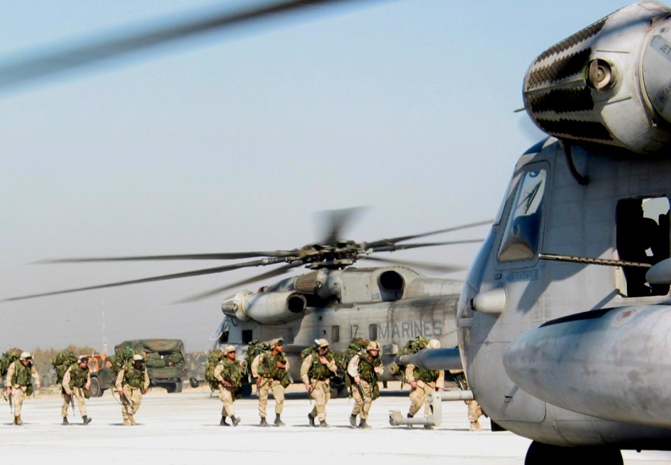 US Navy 030217-N-1050K-029 More than 1,000 U.S. Marines assigned to the 1st Battalion, 2nd Marines board CH-53E Super Stallions
