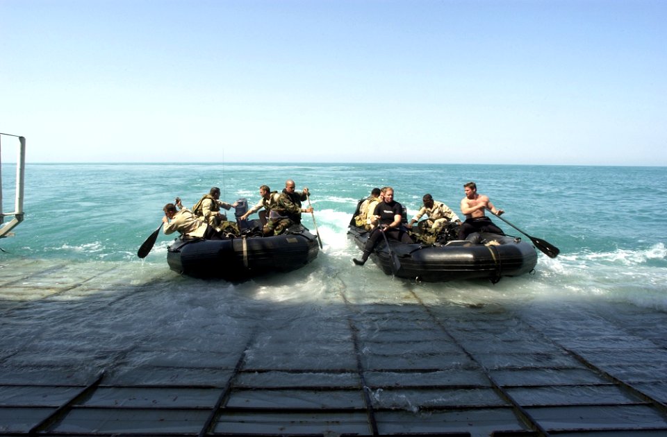 US Navy 030317-N-5319A-013 Members of the Dive Platoon crew from Commander Task Unit (CTU-55.4.3) launch their dive boats from the well deck of the USS Gunston Hall (LSD 44) operating in the Arabian Gulf