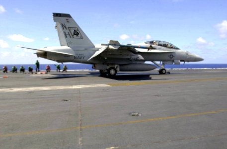 US Navy 030322-N-9319H-003 An F-A-18F Super Hornet prepares to launch from one of four steam driven catapults on the flight deck of USS Nimitz (CVN 68)