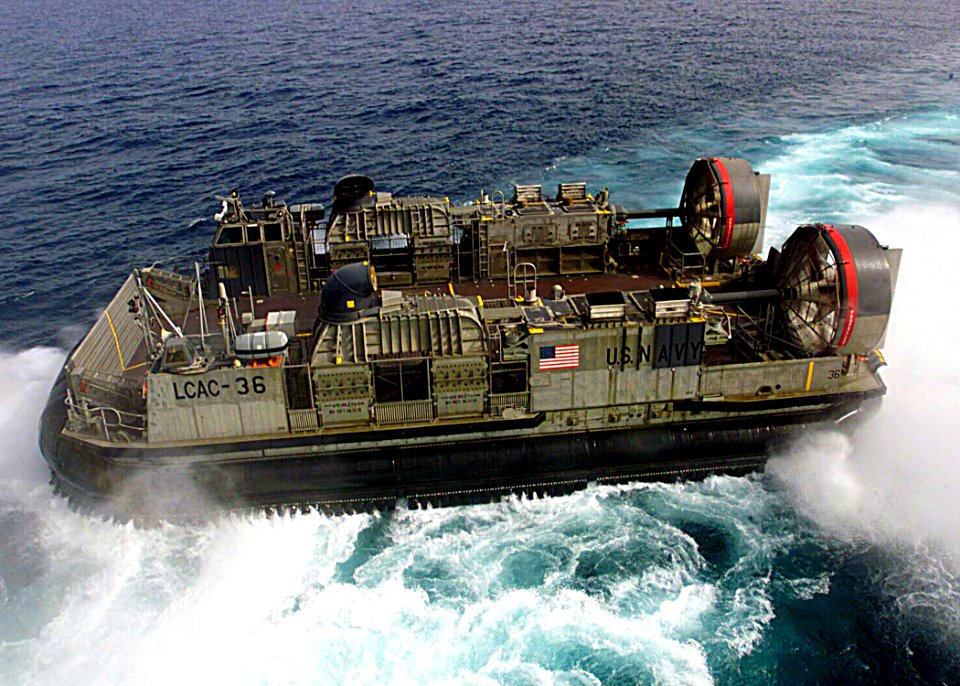 US Navy 030324-N-1512S-549 Hopper 36 from Assault Craft Unit Four (ACU-4) departs the USS Kearsarge (LHD 3) during Landing Craft Air Cushion (LCAC) operations in the Arabian Gulf