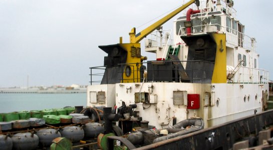 US Navy 030326-N-1050K-003 Four Iraqi vessels are intercepted in the Khor Abd Allah waterway by U.S.-led coalition forces and transported to Camp Patriot, Kuwait, by coalition vessels under the protection of seaward security fo