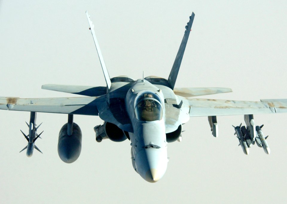 US Navy 030321-F-7203T-008 A U.S. Navy F-A-18 Hornet proceeds on its mission in support of Operation Iraqi Freedom