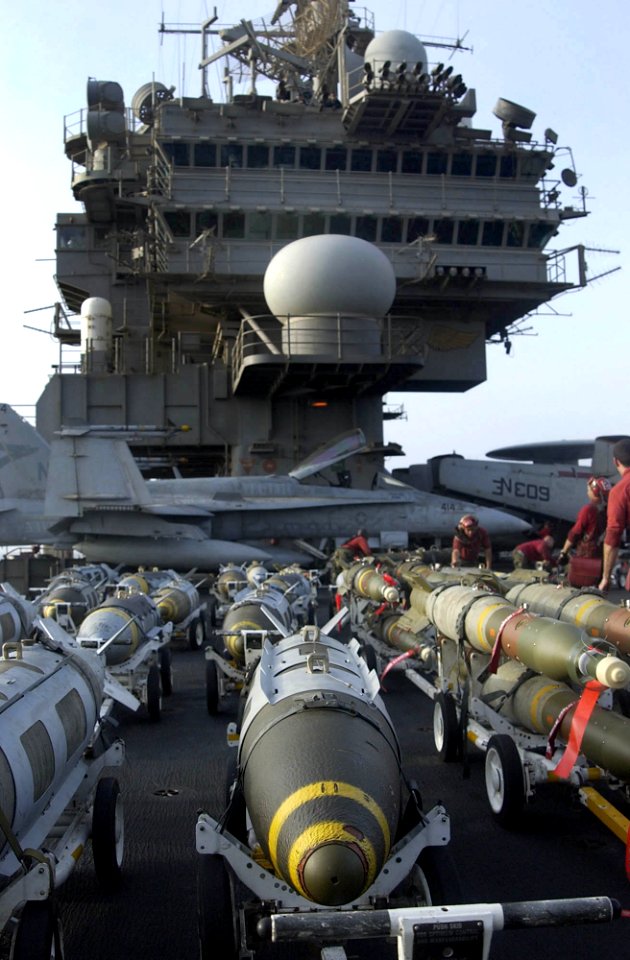 US Navy 030323-N-4142G-043 Assorted bombs are raised to the flight deck on elevators aboard USS Constellation (CV 64)