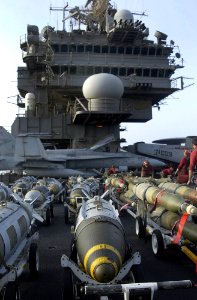 US Navy 030323-N-4142G-043 Assorted bombs are raised to the flight deck on elevators aboard USS Constellation (CV 64)
