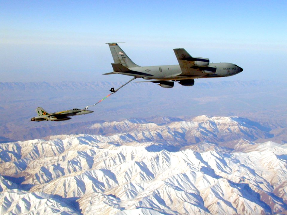 US Navy 030402-N-0000X-101 An F-A-18 Hornet assigned to the 'Silver Eagles' of Marine Fighter-Attack Squadron One Fifteen (VMFA-115) conducts in flight refueling exercises with a KC-135 Stratotanker over Iraq