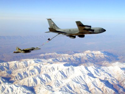 US Navy 030402-N-0000X-101 An F-A-18 Hornet assigned to the 'Silver Eagles' of Marine Fighter-Attack Squadron One Fifteen (VMFA-115) conducts in flight refueling exercises with a KC-135 Stratotanker over Iraq