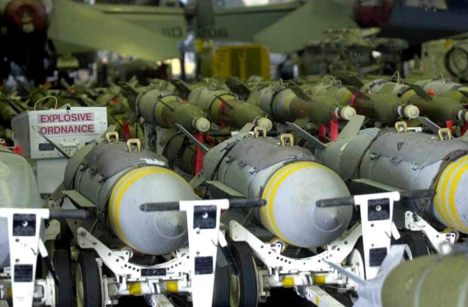 US Navy 030403-N-2385R-003 Various bombs are staged in the hanger bay for inspection prior to being loaded onto Carrier Air Wing Eleven (CVW-11) aircraft aboard USS Nimitz (CVN 68)