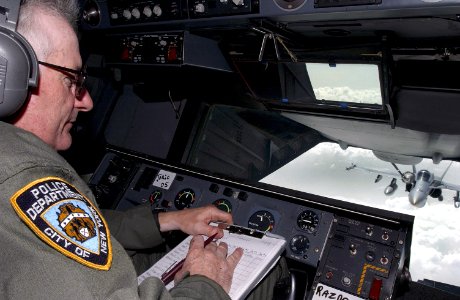 US Navy 030409-F-1631A-004 KC-10 Boom Operator, SMSgt Anthony Bartolomeo, delivers fuel to an F-A-18 Hornet flying missions in Operation Iraqi Freedom