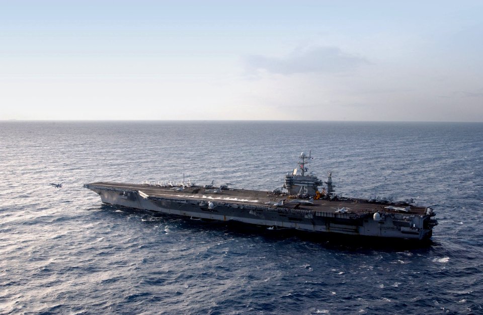 US Navy 030326-N-9851B-037 An F-A-18 Hornet launches from the flight deck of USS Harry S. Truman (CVN 75)