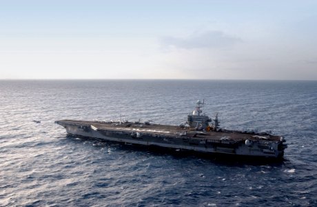 US Navy 030326-N-9851B-037 An F-A-18 Hornet launches from the flight deck of USS Harry S. Truman (CVN 75)