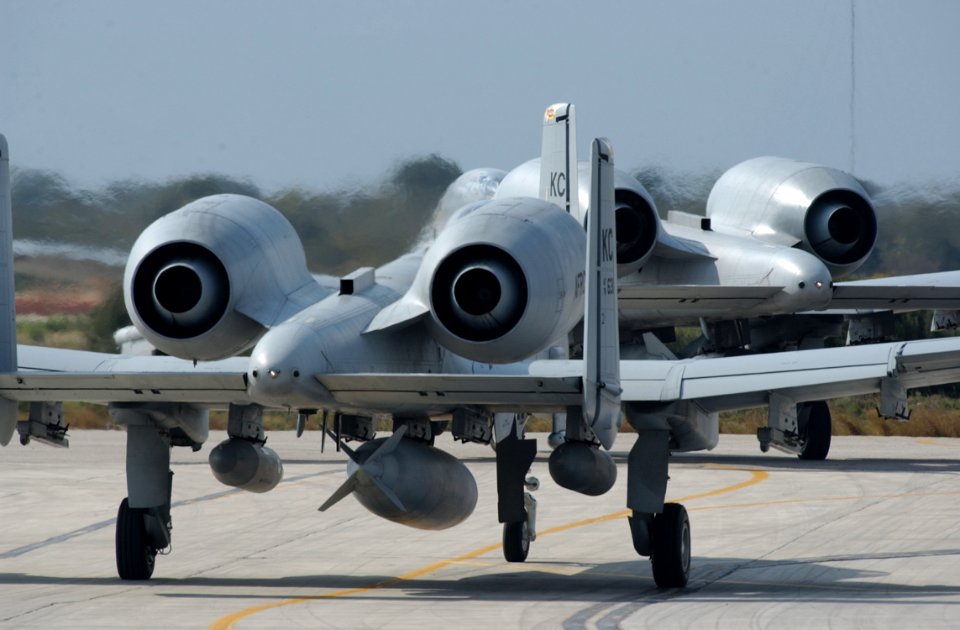 US Navy 030406-N-0780F-028 U.S. Air Force A-10 Thunderbolts taxi for takeoff from a stop-over point while transiting to a forward deployed location in support of Operation Iraqi Freedom