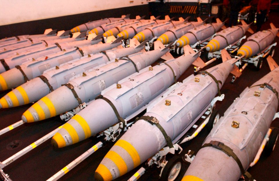 US Navy 030323-N-1328C-507 GBU-31 Joint Direct Attack Munitions (JDAM) are staged in the hanger bay