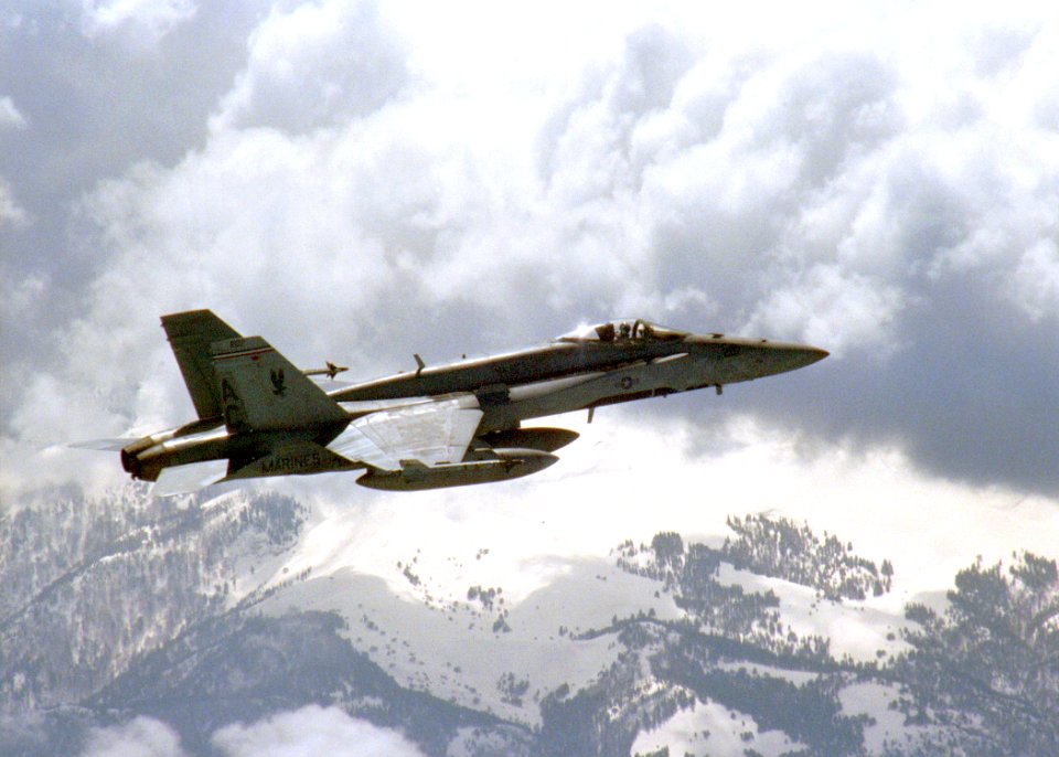 US Navy 030401-N-0000X-004 An F-A-18 Hornet assigned to the 'Silver Eagles' of Marine Fighter Attack Squadron One Fifteen (VMFA-115) conducts combat missions over Iraq