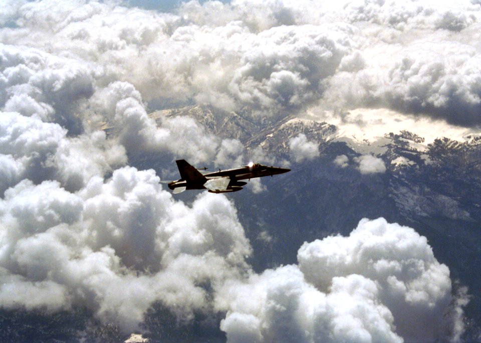 US Navy 030401-N-0000X-003 An F-A-18 Hornet assigned to the 'Silver Eagles' of Marine Fighter-Attack Squadron One Fifteen (VMFA-115) conducts combat missions over Iraq