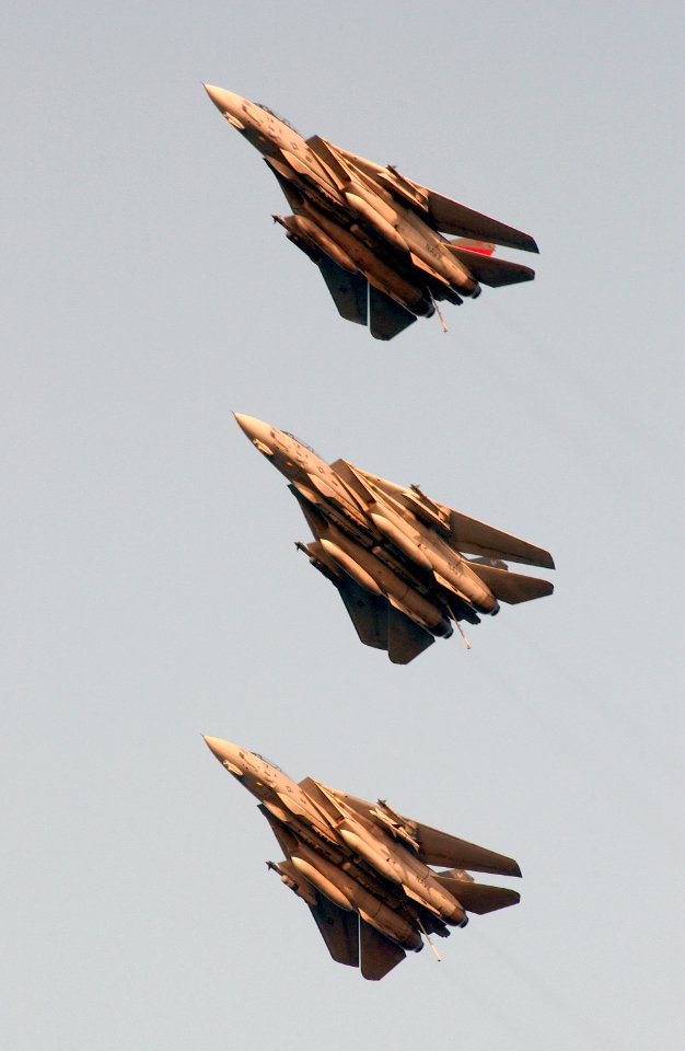 US Navy 030403-N-1810F-003 F-14A Tomcats fly in formation on final approach to USS Kitty Hawk (CV 63)