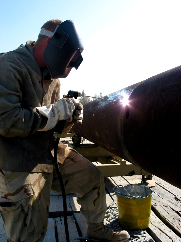 US Navy 030402-N-1050K-037 Steelworker Constructionman Patrick Lewis from Kenosha, Wis., is attached to Amphibious Construction Battalion Two (ACB-2) stationed at Little Creek, Va