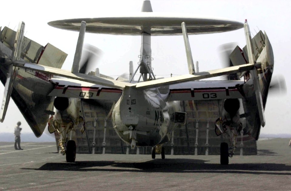 US Navy 030404-N-2385R-005 An E-2C Hawkeye assigned to the Wallbangers of Carrier Airborne Early Warning Squadron One Seventeen (VAW-117) lines-up behind a jet blast deflector (JBD)