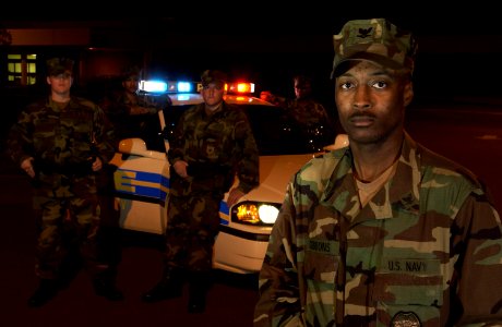US Navy 030405-N-5862D-046 Master-at-Arms 3rd Class Terrance Gibbons from Augusta, Ga., is a key member of the Naval Support Activity (NSA) Mid-South Police Force photo