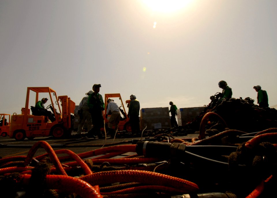 US Navy 080901-N-9079D-117 Sailors receive supplies during an underway replenishment