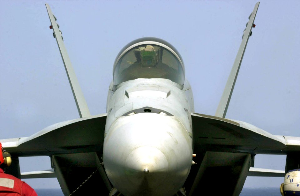 US Navy 030404-N-2385R-004 An F-A-18E Super Hornet assigned to the Top Hatters of Strike Fighter Squadron Fourteen (VFA-14) prepares for its next mission