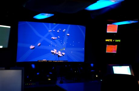 US Navy 030422-F-5820C-006 Aboard USS Blue Ridge (LCC-19), aircraft and ships are tracked on screen utilizing the Area Air Defense Coordinator