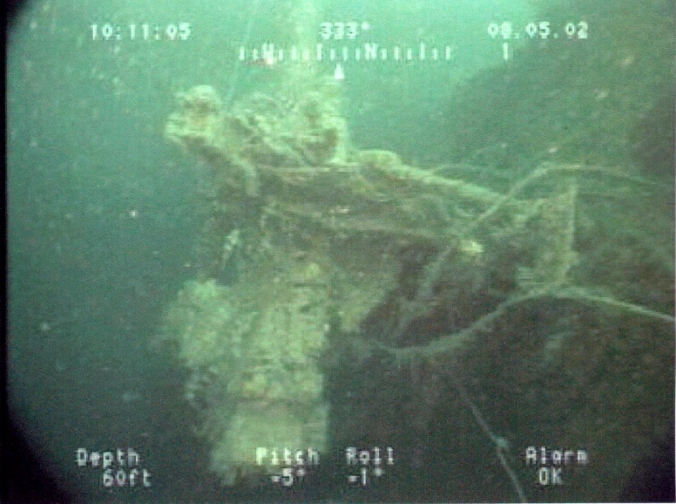 US Navy 030411-N-0000X-002 A remotely operated vehicle (ROV) pilot from Naval Surface Warfare Center, Carderock Division (NSWCCD) located in Bethesda, Maryland, took this photograph of a 3-50-caliber gun mounted on the s