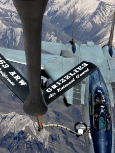 US Navy 030411-N-0780F-041 An U.S. Navy F-14B Tomcat assigned to the Swordsmen of Fighter Squadron Three Two (VF-32) receives fuel from an Air National Guard Boeing KC-135 Stratotanker assigned to the 163rd Air Refueling Wing