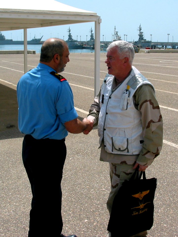 US Navy 030423-N-1050K-001 (From left to right) Maj. Gen. Ahmed Y. Al Mulla, Commander, Kuwait Naval Forces, greets Vice Adm. Timothy J. Keating, Commander, Fifth Fleet and U.S. Naval Forces Central Command, during a recent vis