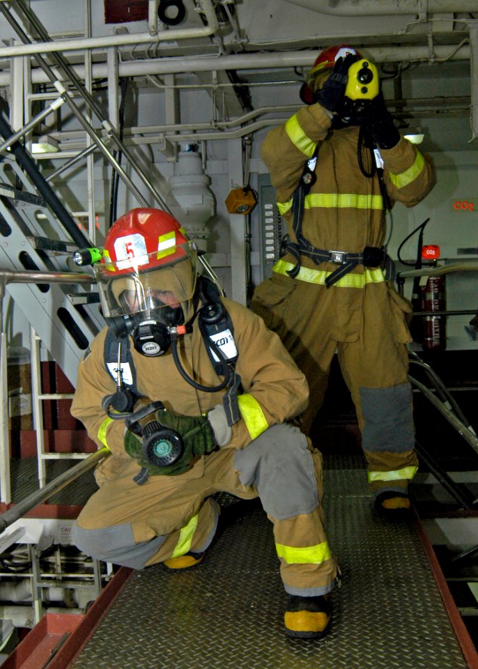 US Navy 080122-N-4649C-041 Crew members prepare to enter a space during a fire drill aboard the guided-missile cruiser USS Shiloh (CG 67)